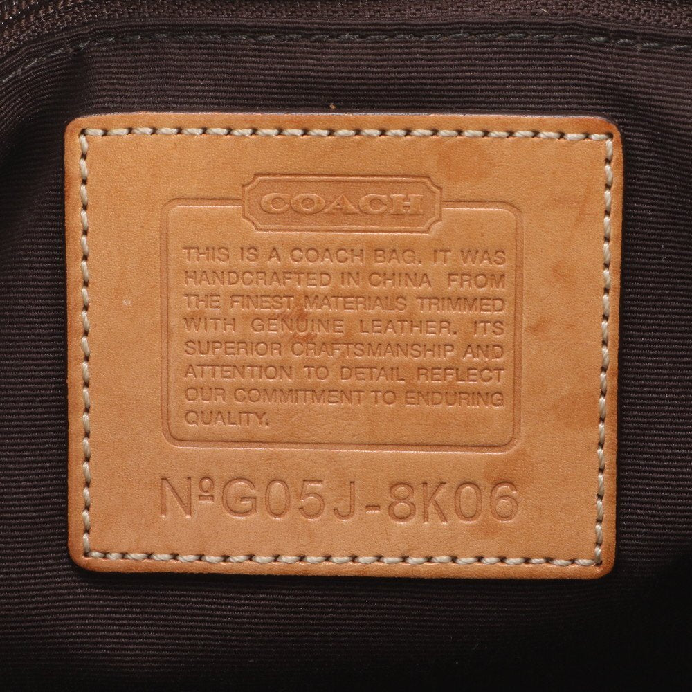 Coach Signature Monogram Canvas Handtasche