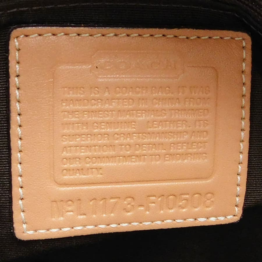 Coach Signature Monogram Canvas Handtasche
