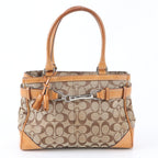 Coach Signature Monogram Canvas Handtasche