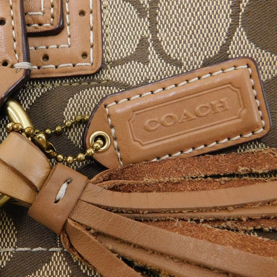 Coach Signature Monogram Canvas Handtasche