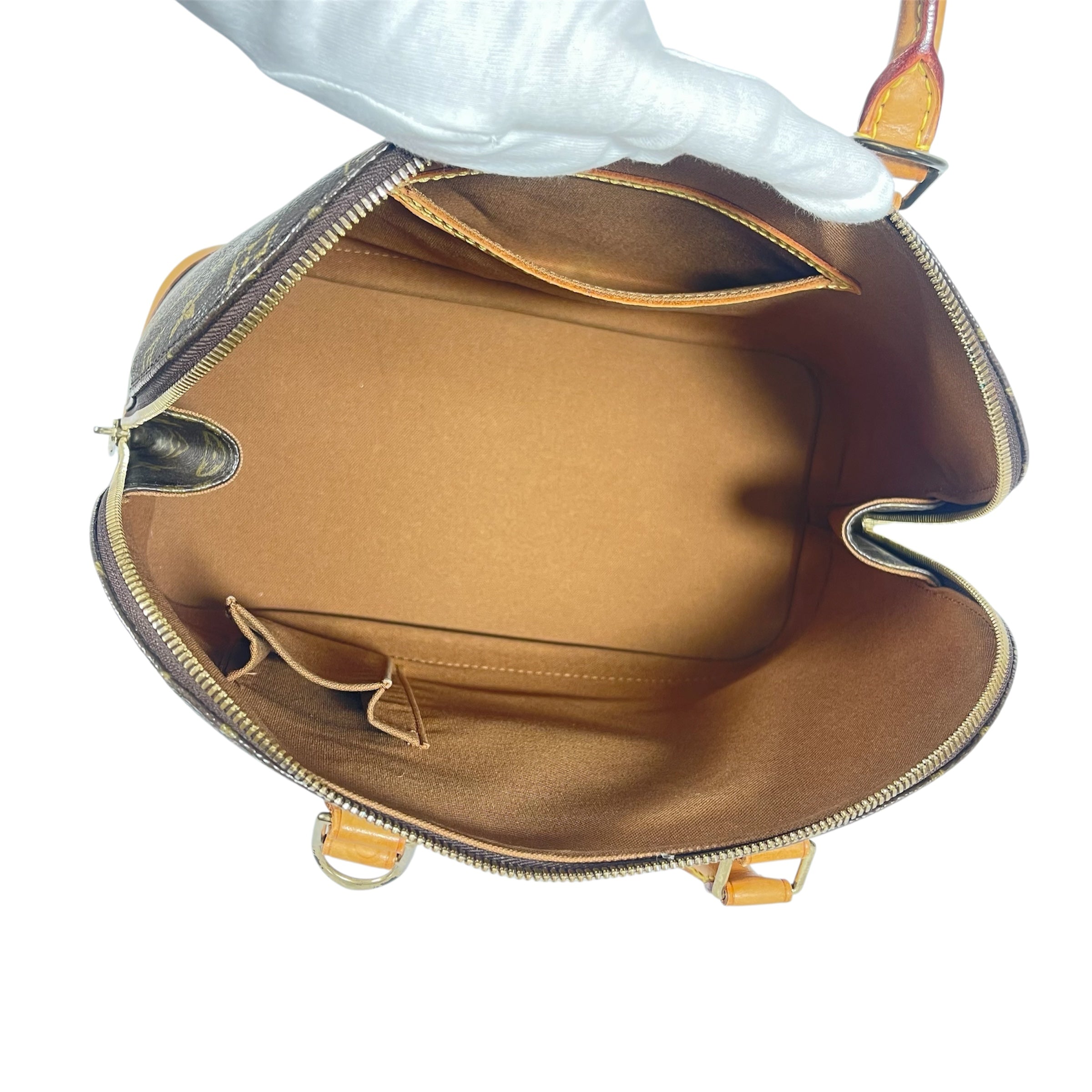 Louis Vuitton Alma PM Monogram Handtasche