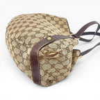 Túi xách The Vintage Mansion Gucci GG canvas họa tiết monogram với chi tiết da nâu và quai đeo vai