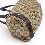 Túi xách The Vintage Mansion Gucci GG Canvas họa tiết monogram màu be với chi tiết da nâu sang trọng