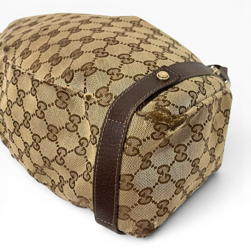 Túi đeo vai The Vintage Mansion Gucci GG canvas họa tiết monogram màu nâu với chi tiết da sang trọng
