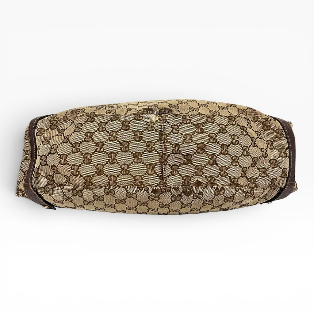 Túi đeo vai The Vintage Mansion Gucci GG canvas họa tiết monogram cổ điển với chi tiết da nâu sang trọng